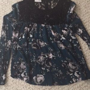Green and black shirt with lace at the top